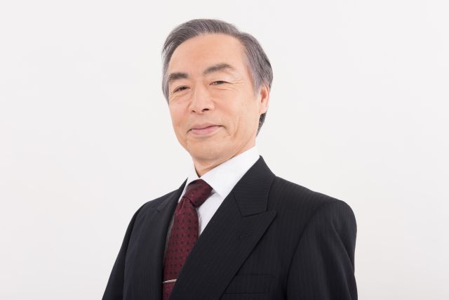 笑みを浮かべる 社長